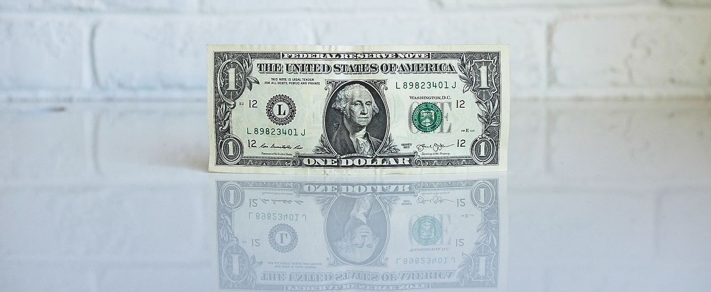 A photo of a one dollar bill.